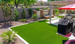 Contemporary backyard hardscape and turf design Gilbert