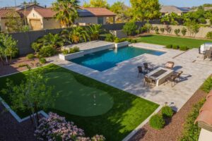 Contemporary backyard landscape remodel and turf design Gilbert