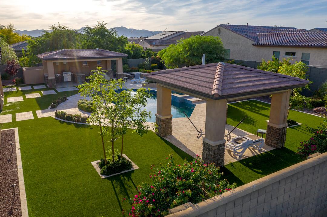Gilbert backyard with a variety of landscape styles, remodeling and design techniques.