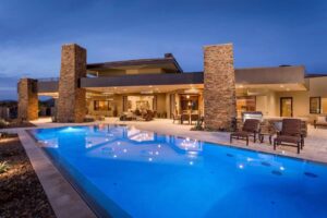 Backyard redesign with landscape lighting and paver patio Scottsdale