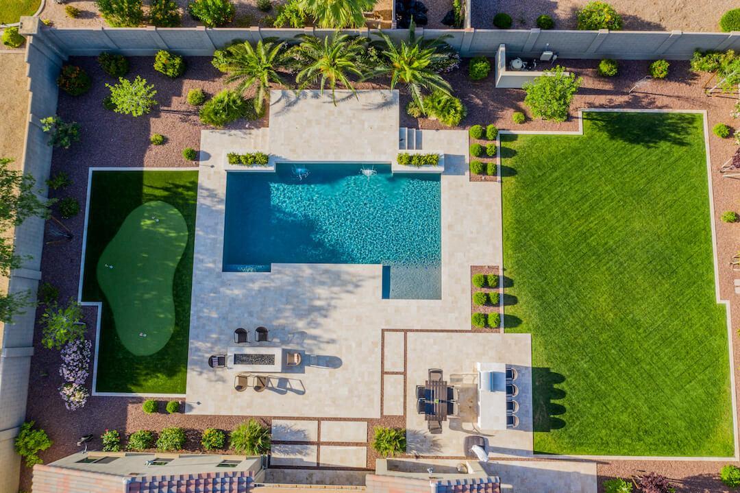 Backyard makeover with artificial turf and lighting Phoenix