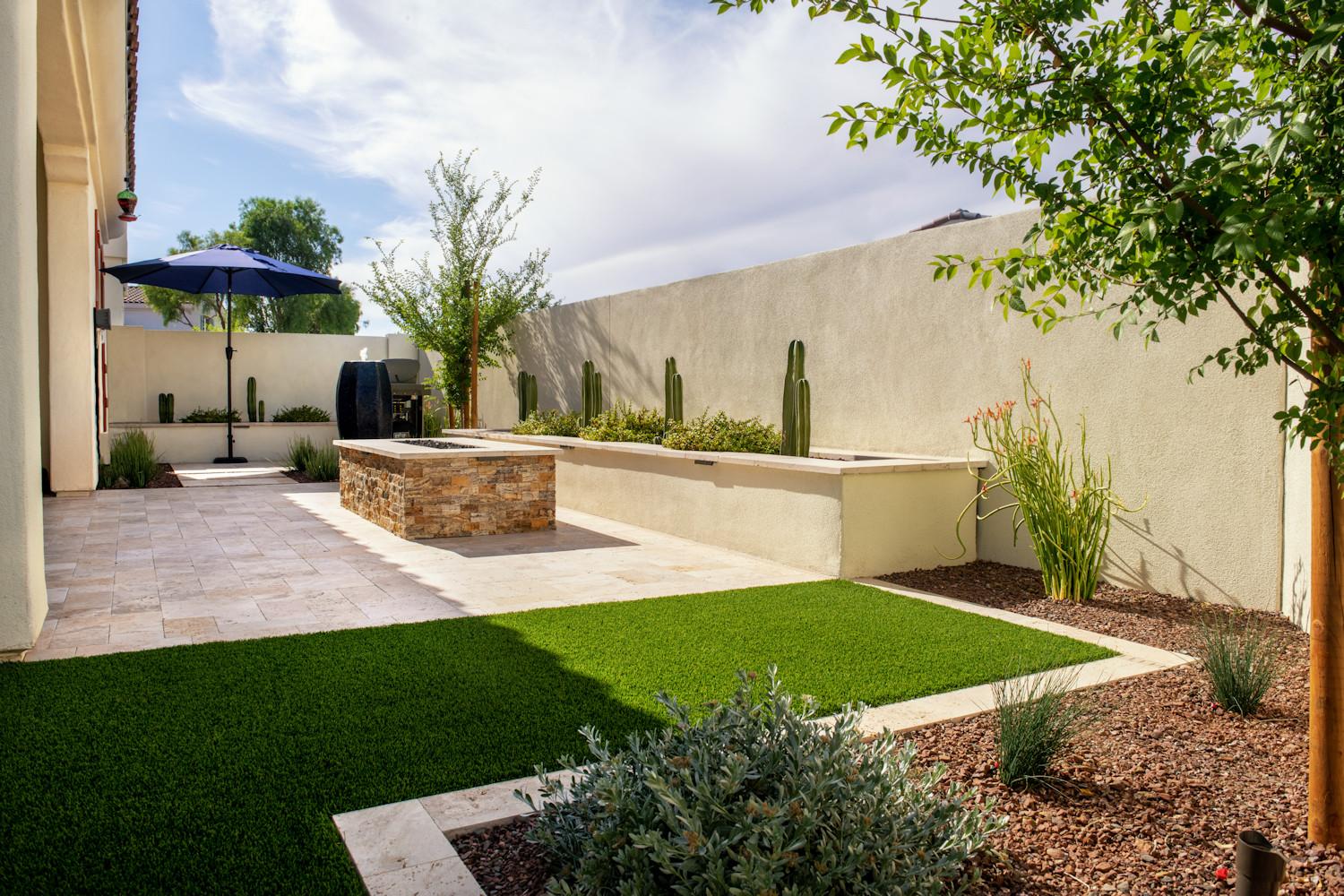 Backyard remodel with fire pit and artificial grass Phoenix