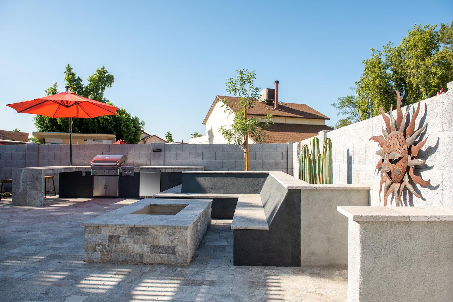 Modern backyard entertainment area with fire feature Chandler