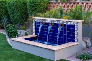 Outdoor renovation with water feature and landscaping Phoenix