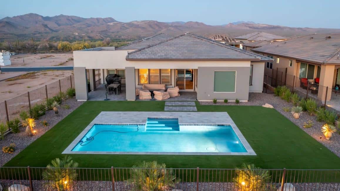 Backyard landscaping design in Gilbert AZ with paver patio and seating