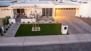 Custom artificial turf with paver driveway and walkway installation in Scottsdale AZ