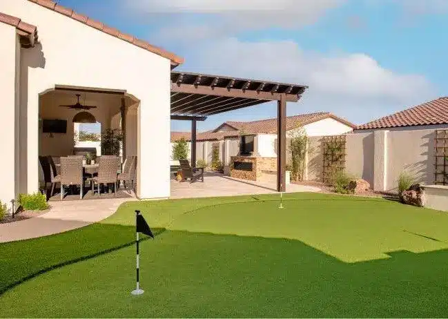 Artificial turf and putting green install in Gilbert home backyard