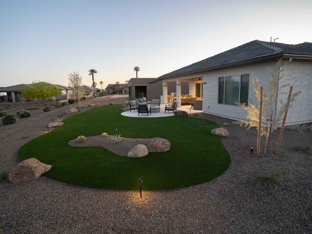 Back yard full landscape design job with artificial turf