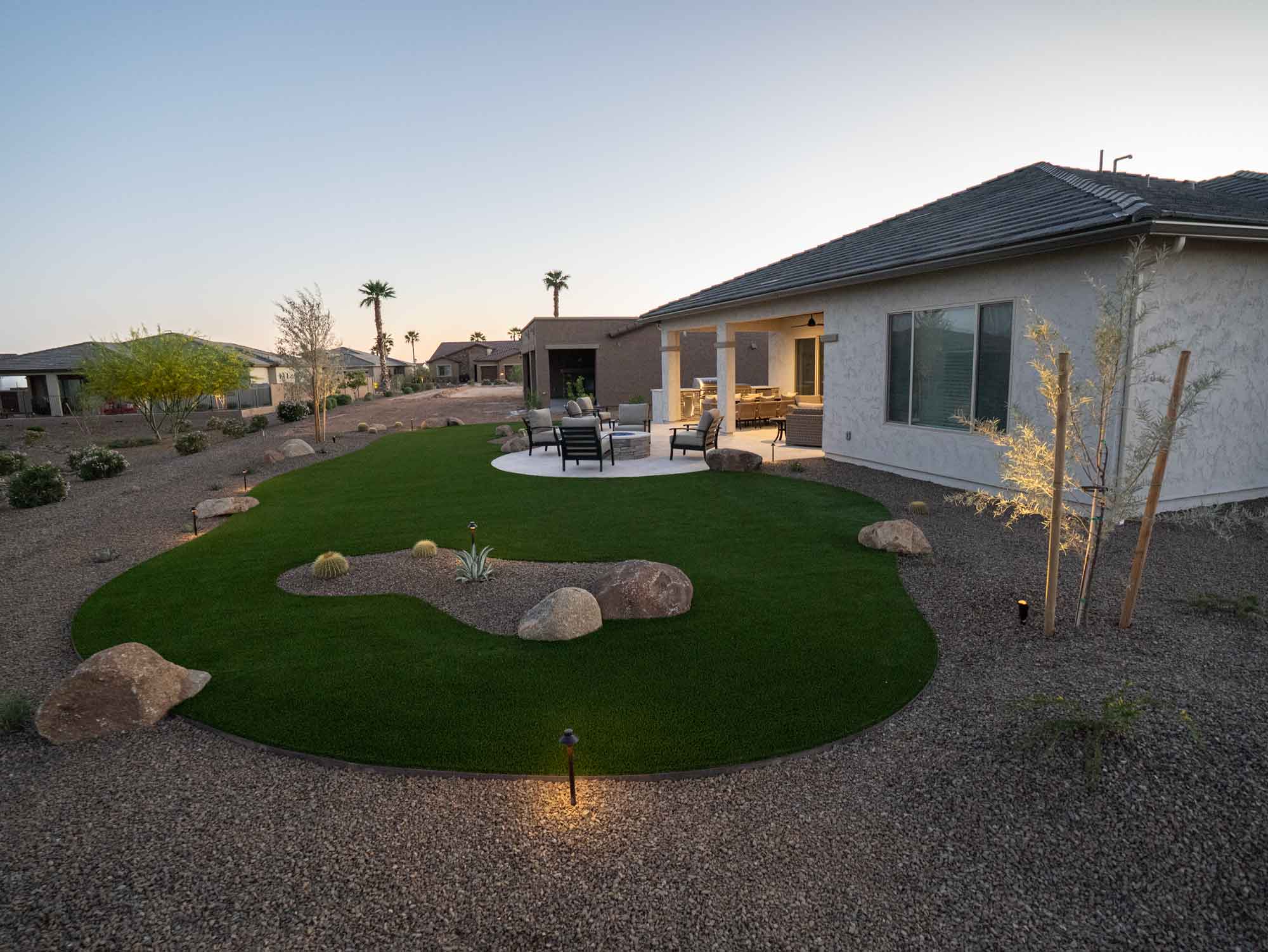Back yard full landscape design job with artificial turf