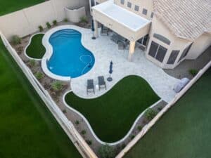 Artificial Turf Near Pool in Phoenix Home Backyard