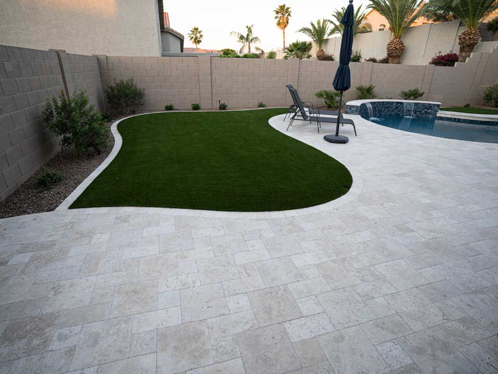 Traver tine Pavers in Backyard landscaping project