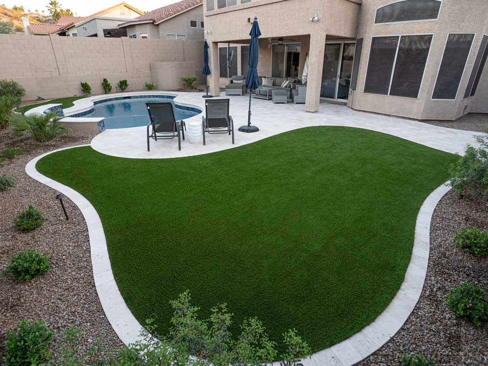 Backyard turf install with yard landscaping design